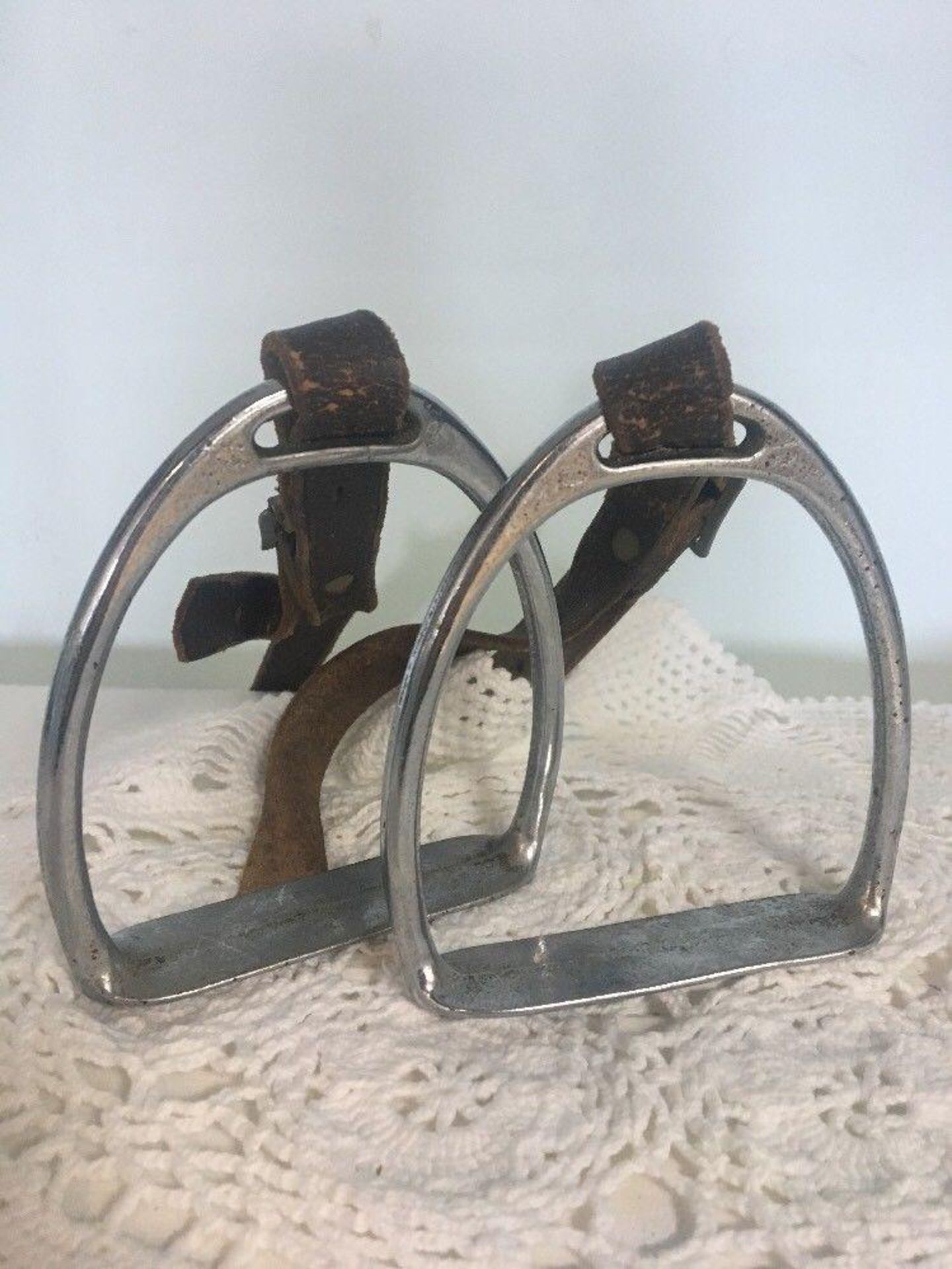 A pair of antique horse stirrups