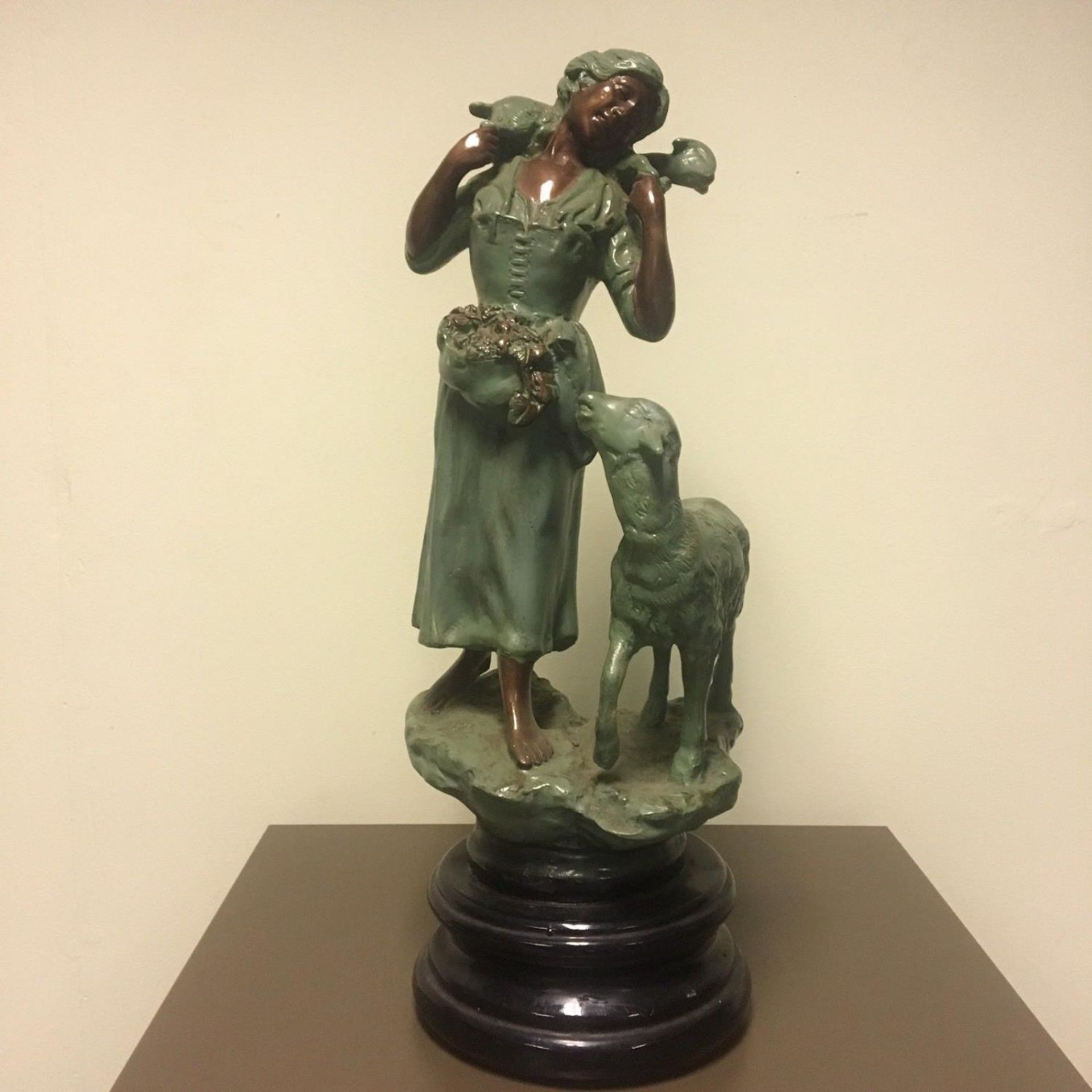 Antique Blackamoor French design figurine, study of a young shepherdess with ewe and lamb on pedesta