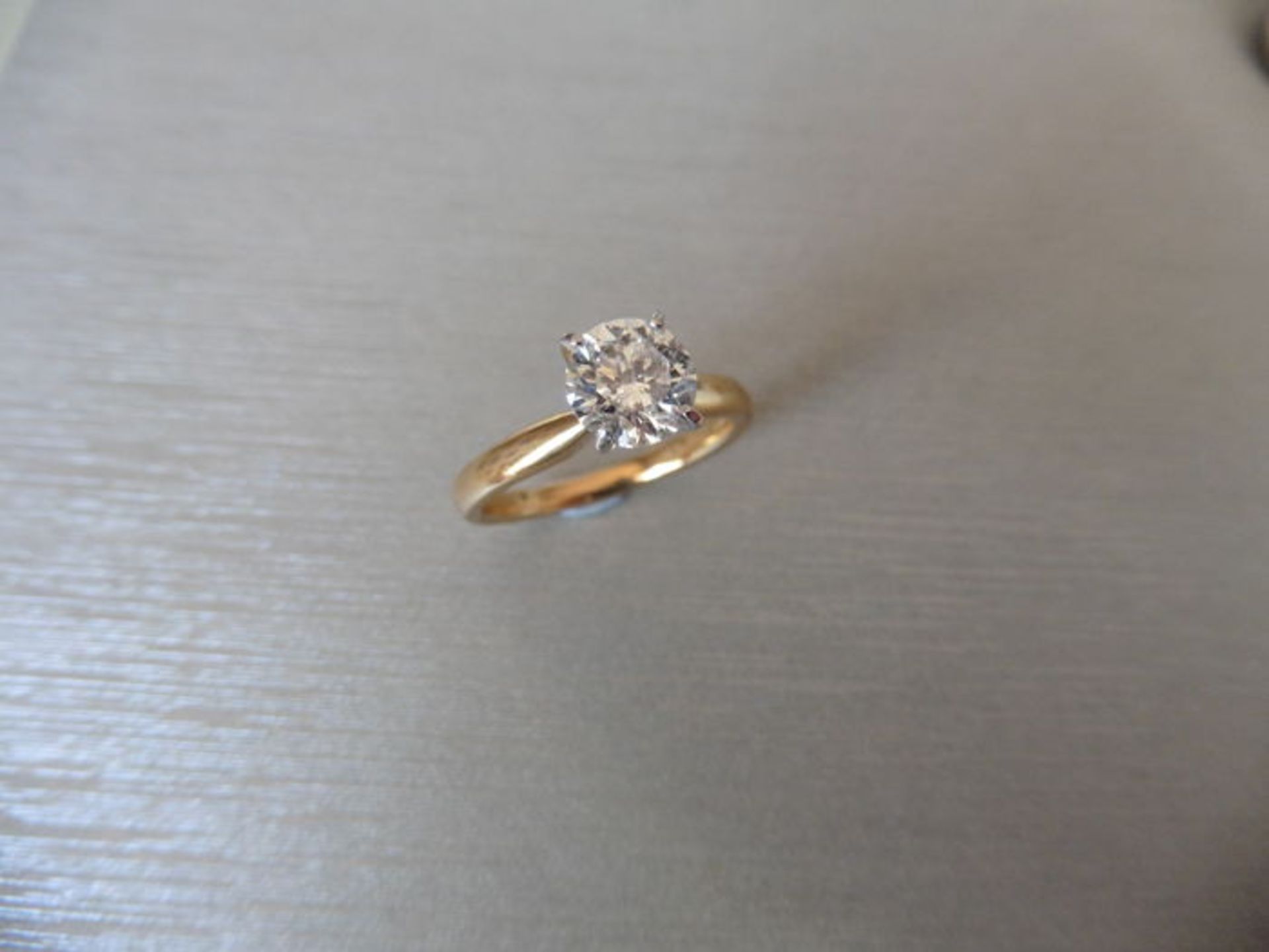 1.06ct diamond solitaire ring with a brilliant cut diamond. F colour and I1 clarity. Set in 18ct