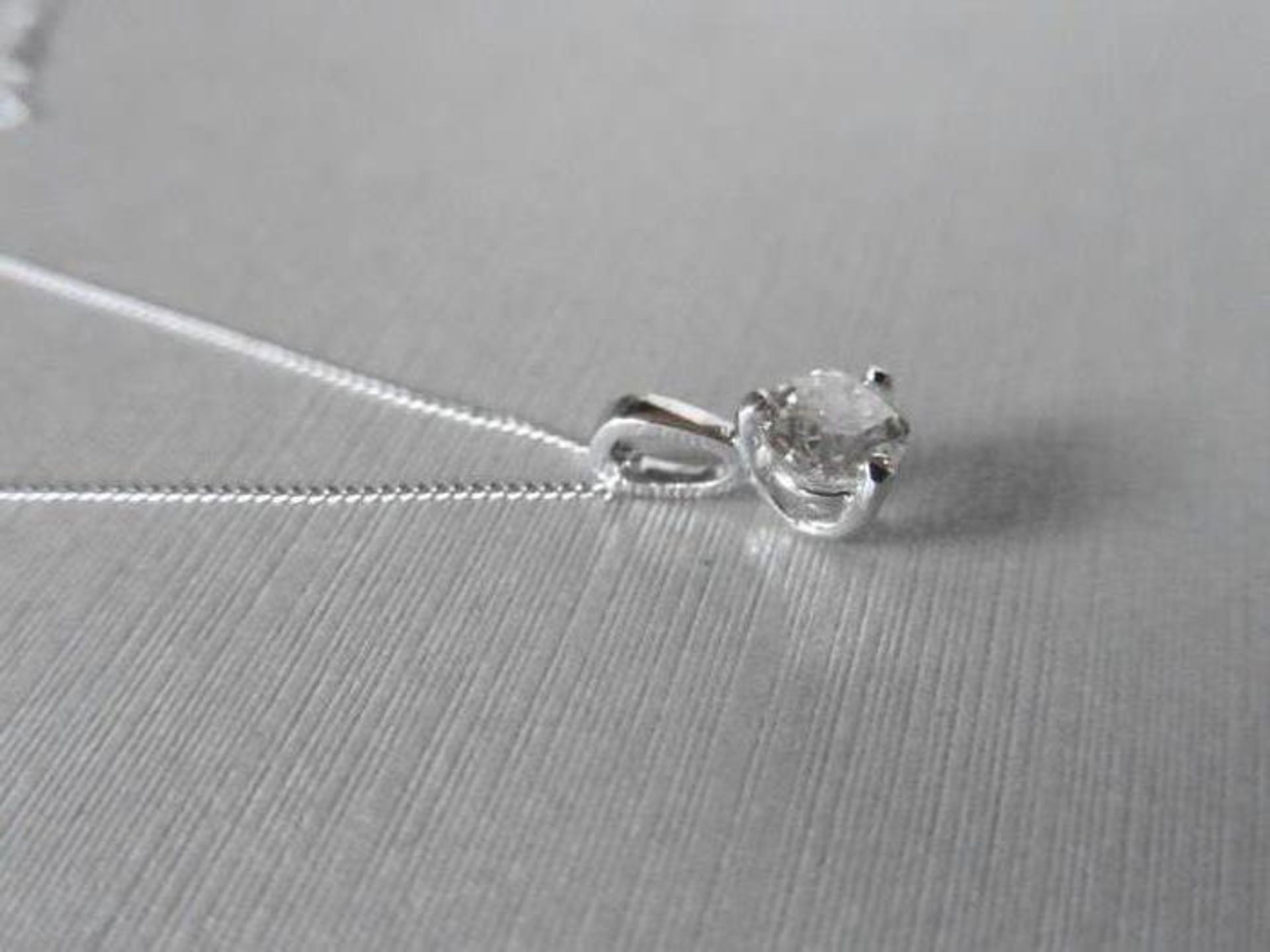 1.00ct diamond solitaire pendant set in a platinum 3 claw setting. H colour and Si2 clarity. 9ct - Image 2 of 3