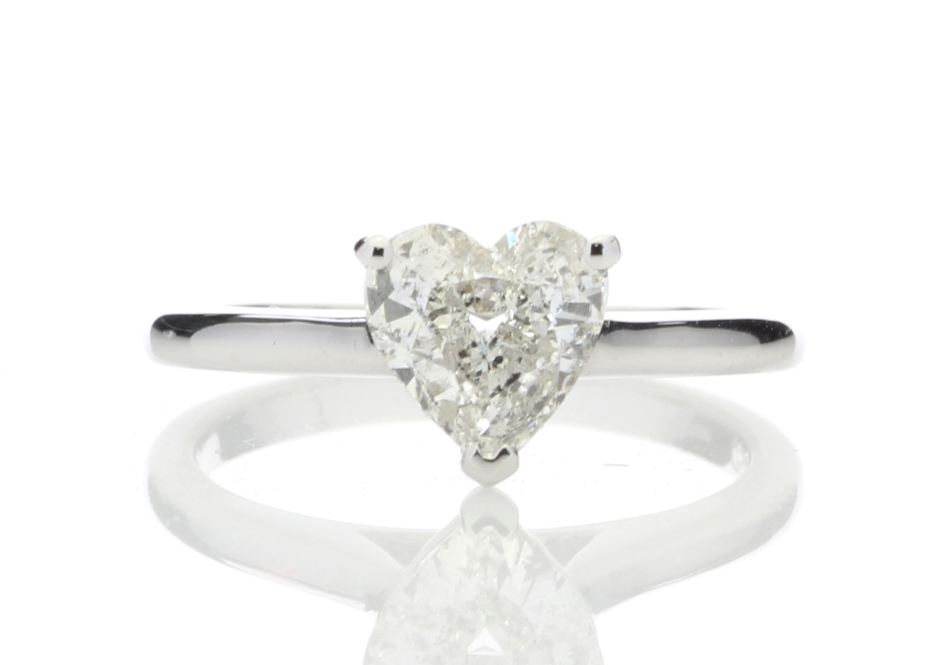 1.04ct diamond solitaire ring set in 18ct gold. Heart shaped diamond, I colour and I1 clarity.