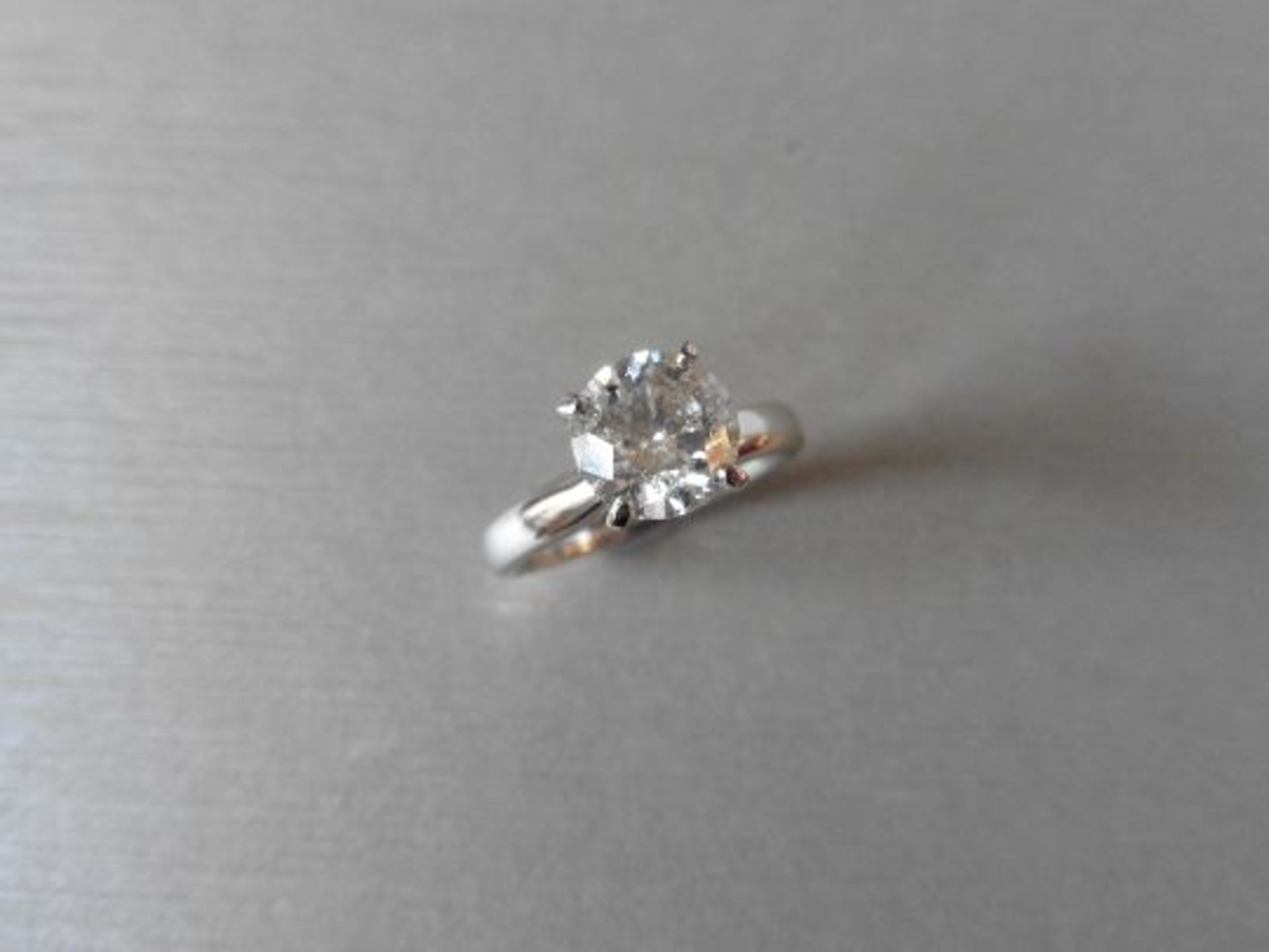 1.15ct diamond solitaire ring set in 18ct white gold. Colour Enchanced diamond, H colour and SI2