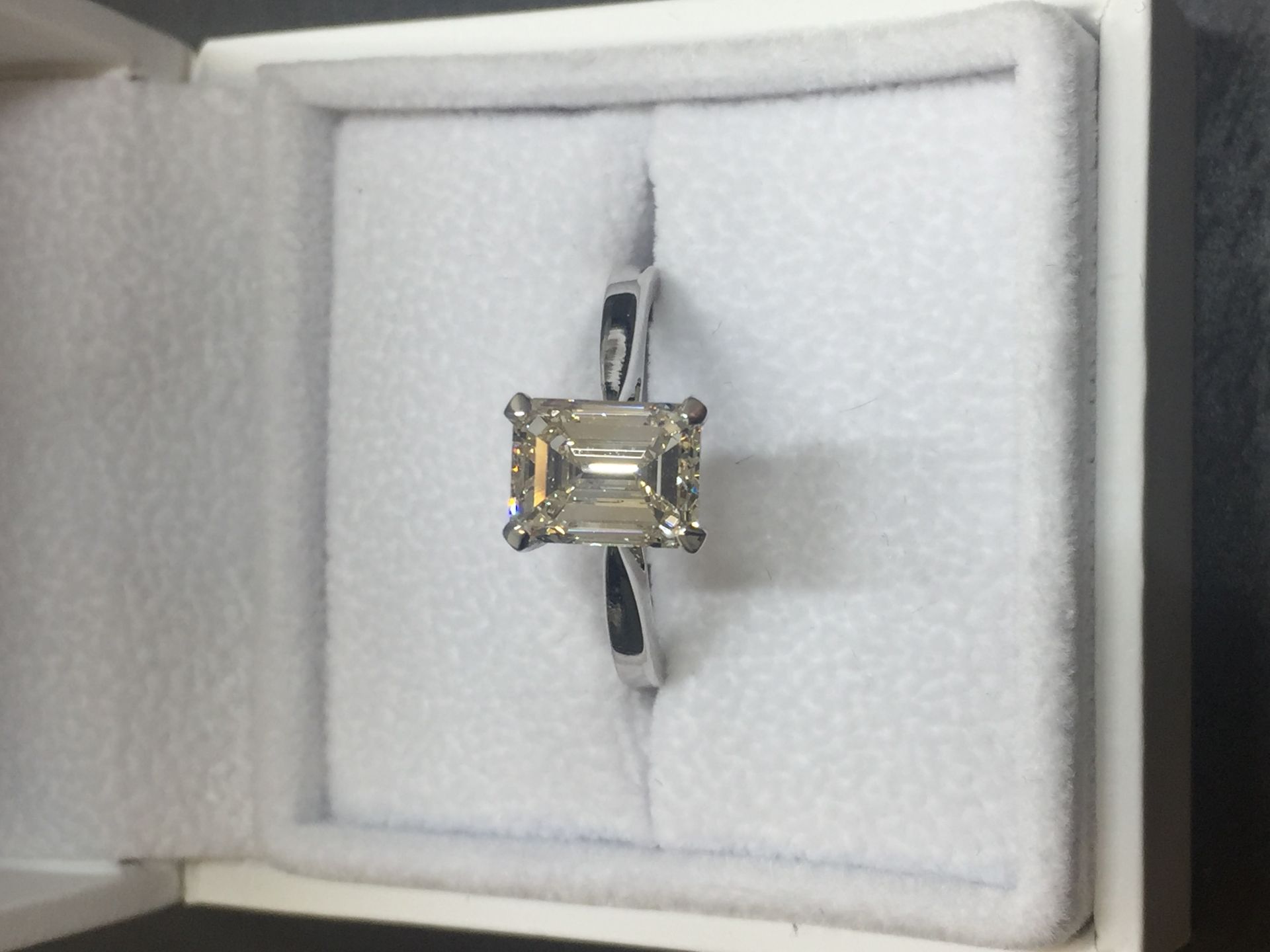 2ct diamond solitaire ring set with an emerald cut diamond, N ( light brown ) colour and VS1 - Image 4 of 5