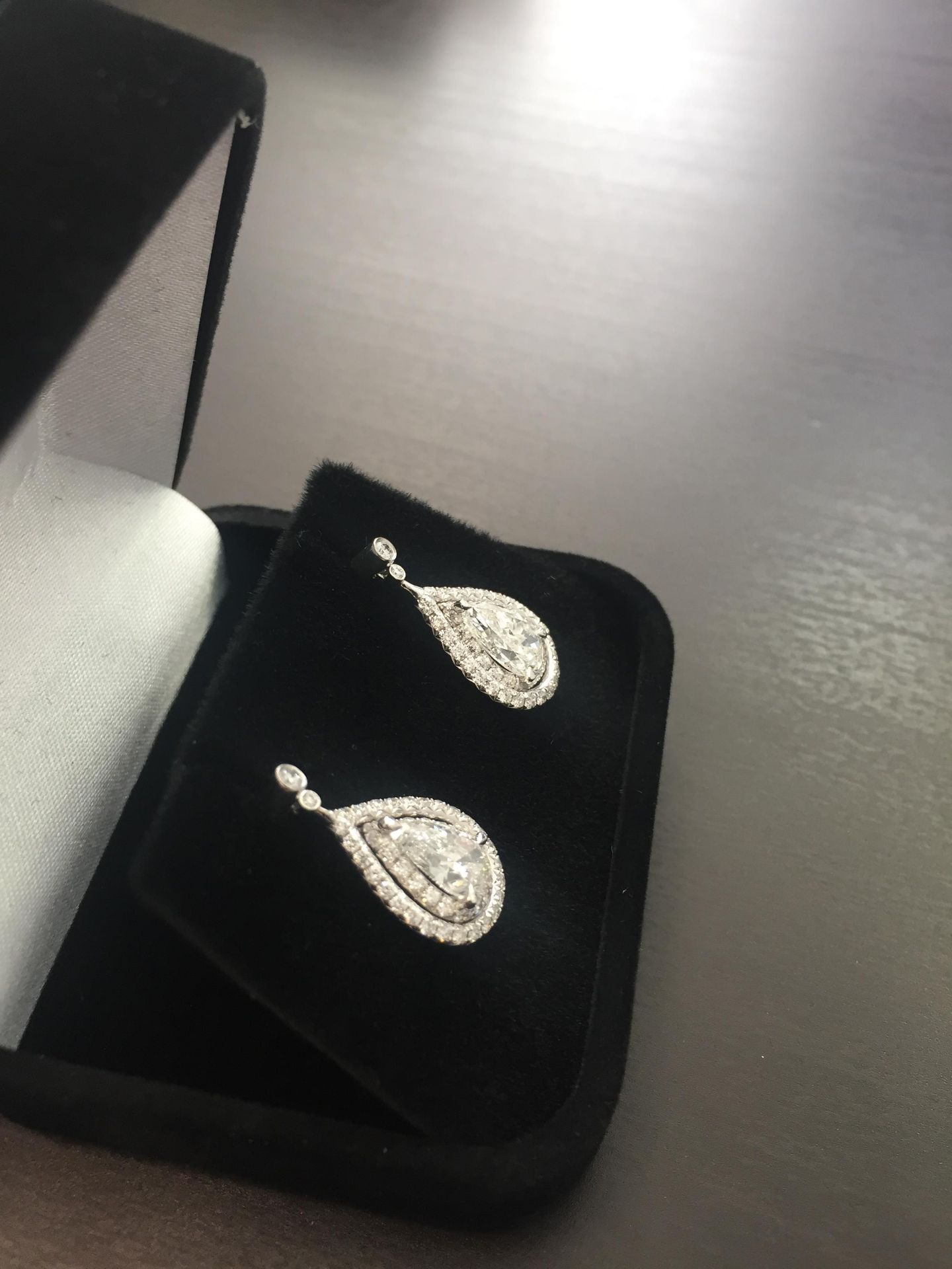 2.04ct diamond drop earrings. Each set with a certificated pear shaped diamond with a halo - Image 2 of 4