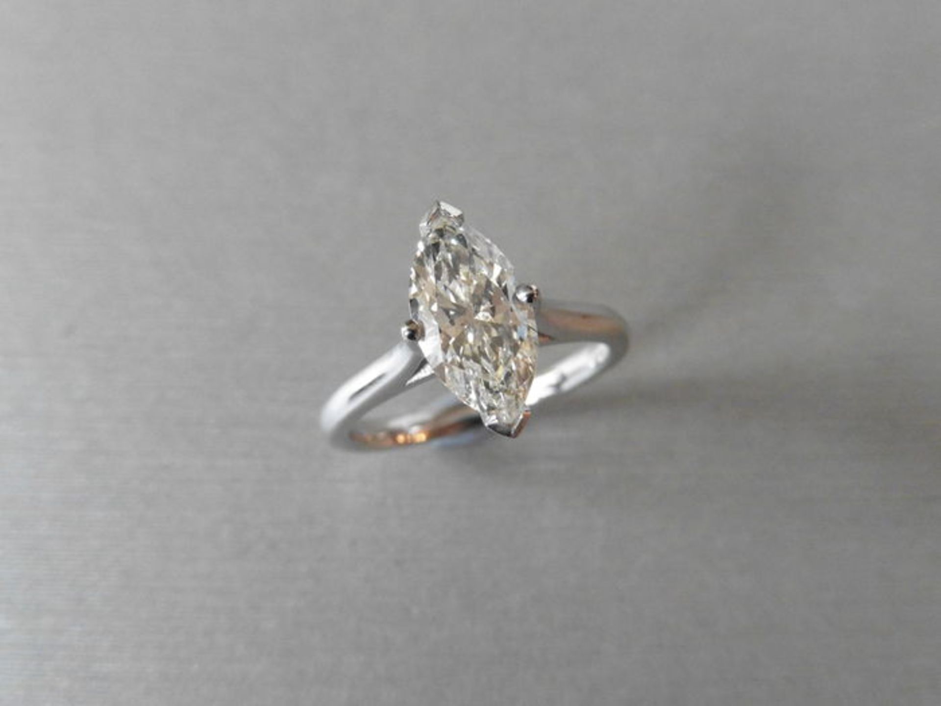 0.70ct diamond solitaire ring set in18ct gold. Marquise diamond, I colour and SI1 clarity. 2 claw