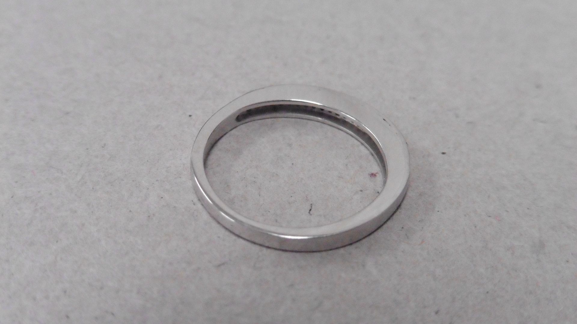 18ct gold diamond set band ring. Small brilliant cut diamonds H-J colour and si3-i1 clarity. Micro - Image 4 of 4
