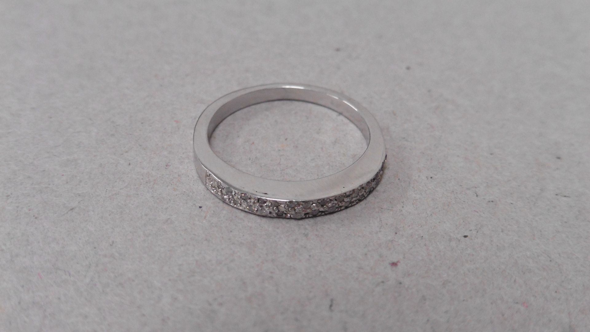18ct gold diamond set band ring. Small brilliant cut diamonds H-J colour and si3-i1 clarity. Micro - Image 3 of 4