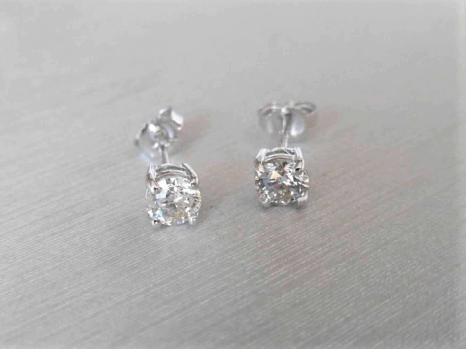 1.20ct diamond solitaire earrings set in 18ct white gold. 2 x brilliant cut diamonds, 0.60ct (