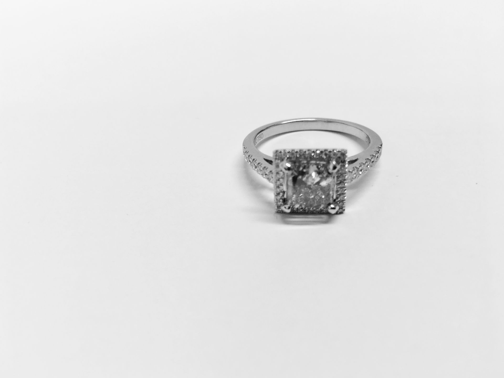 1.75ct diamond set solitaire ring set in 18ct. Princess cut diamond in the centre, I colourand I2