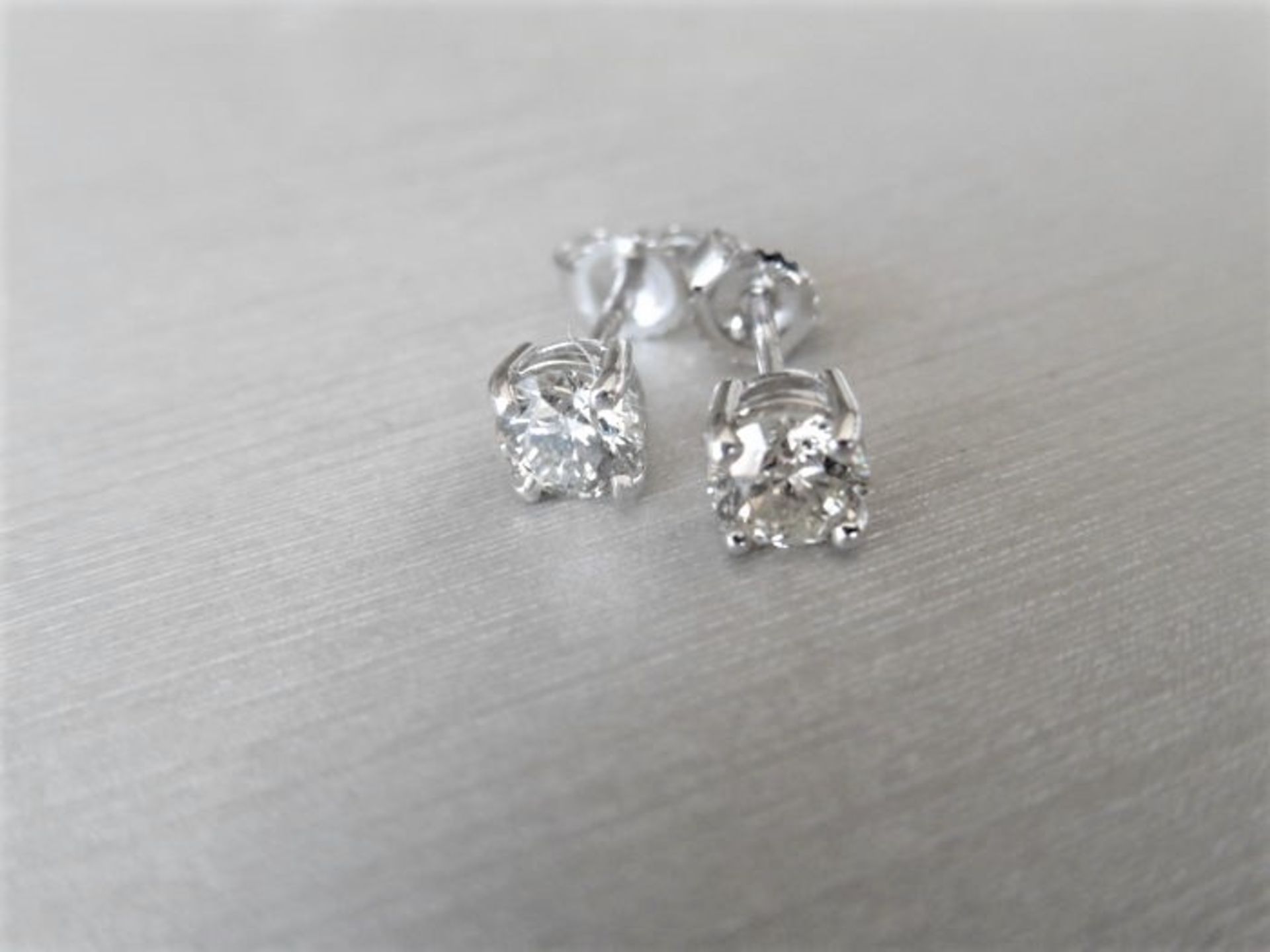 1.00ct diamond solitaire earrings set in 18ct white gold. 2 x brilliant cut diamonds, 0.50ct (