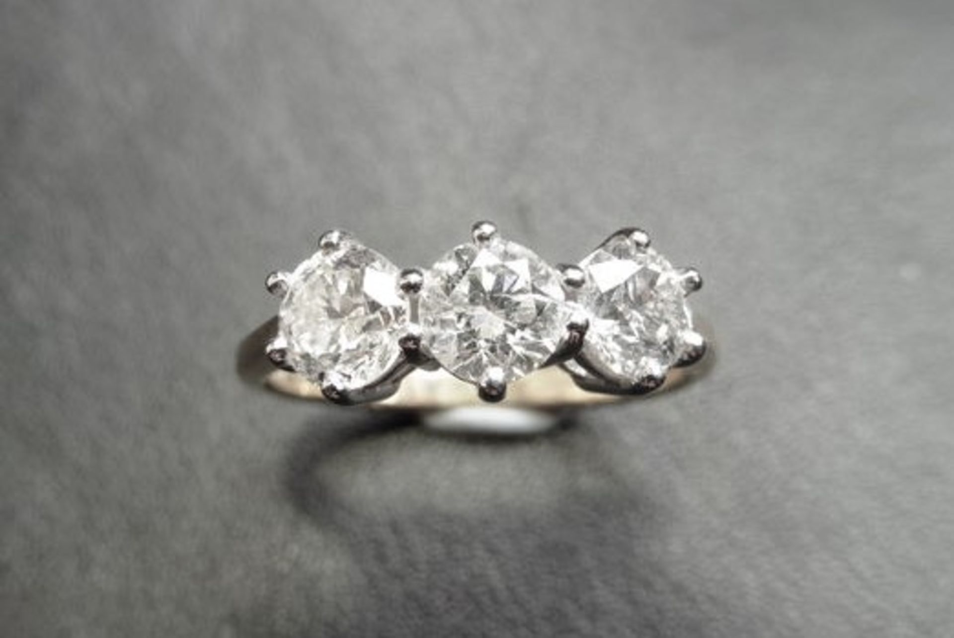 1.50ct diamond trilogy ring. 3 brilliant cut diamonds 0.50ct each, G/H colour, VS clarity. (