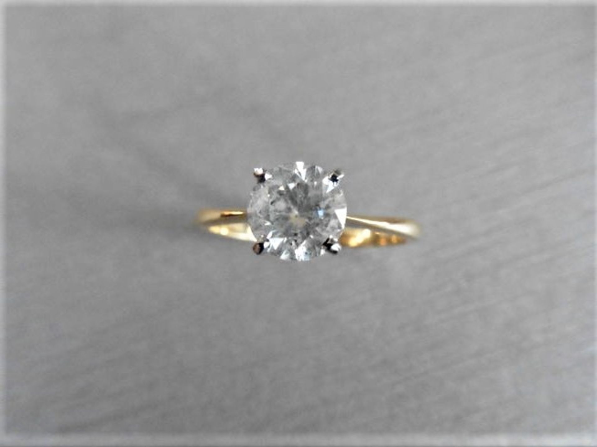 1.63ct diamond solitaire ring set in 18ct gold. H colour and I2 clarity. 4 claw white gold setting