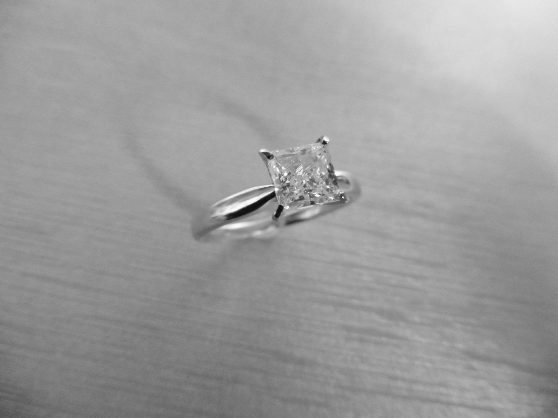 1.09ct diamond solitaire ring set with a princess cut diamond. Enhanced diamond, G/H colour and I2