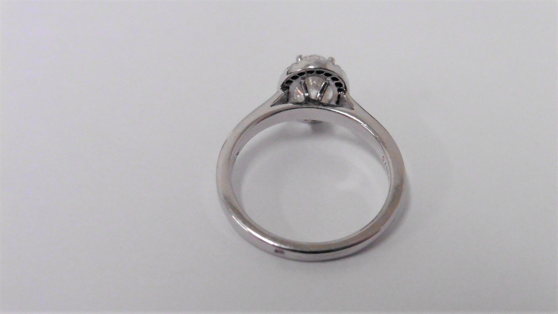 0.95ct diamond set solitaire ring set in platinum. Oval cut diamond, I colour and VS clarity, - Image 3 of 4