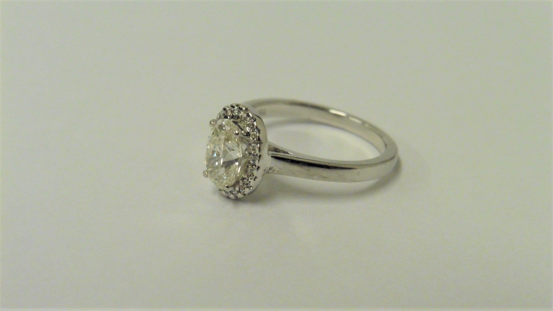 0.95ct diamond set solitaire ring set in platinum. Oval cut diamond, I colour and VS clarity, - Image 2 of 4