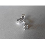 0.50ct diamond solitaire stud earrings set in platinum. I/J colour, si2 clarity.4 claw setting