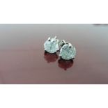 2.02ct Solitaire diamond stud earrings set with brilliant cut diamonds. I colour, I1-2 clarity Set