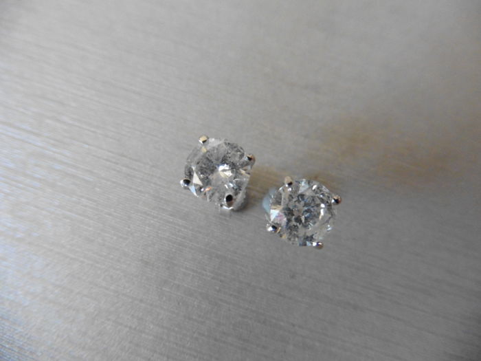 2.00ct Solitaire diamond stud earrings set with brilliant cut diamonds. I colour, I1-2 clarity Set