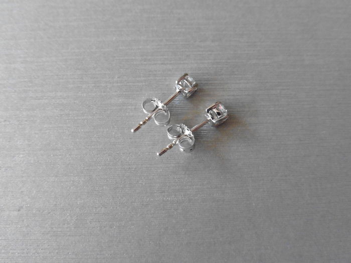 0.25ct diamond solitaire stud earrings set in platinum. I colour, si3 clarity.4 claw setting with - Image 2 of 2