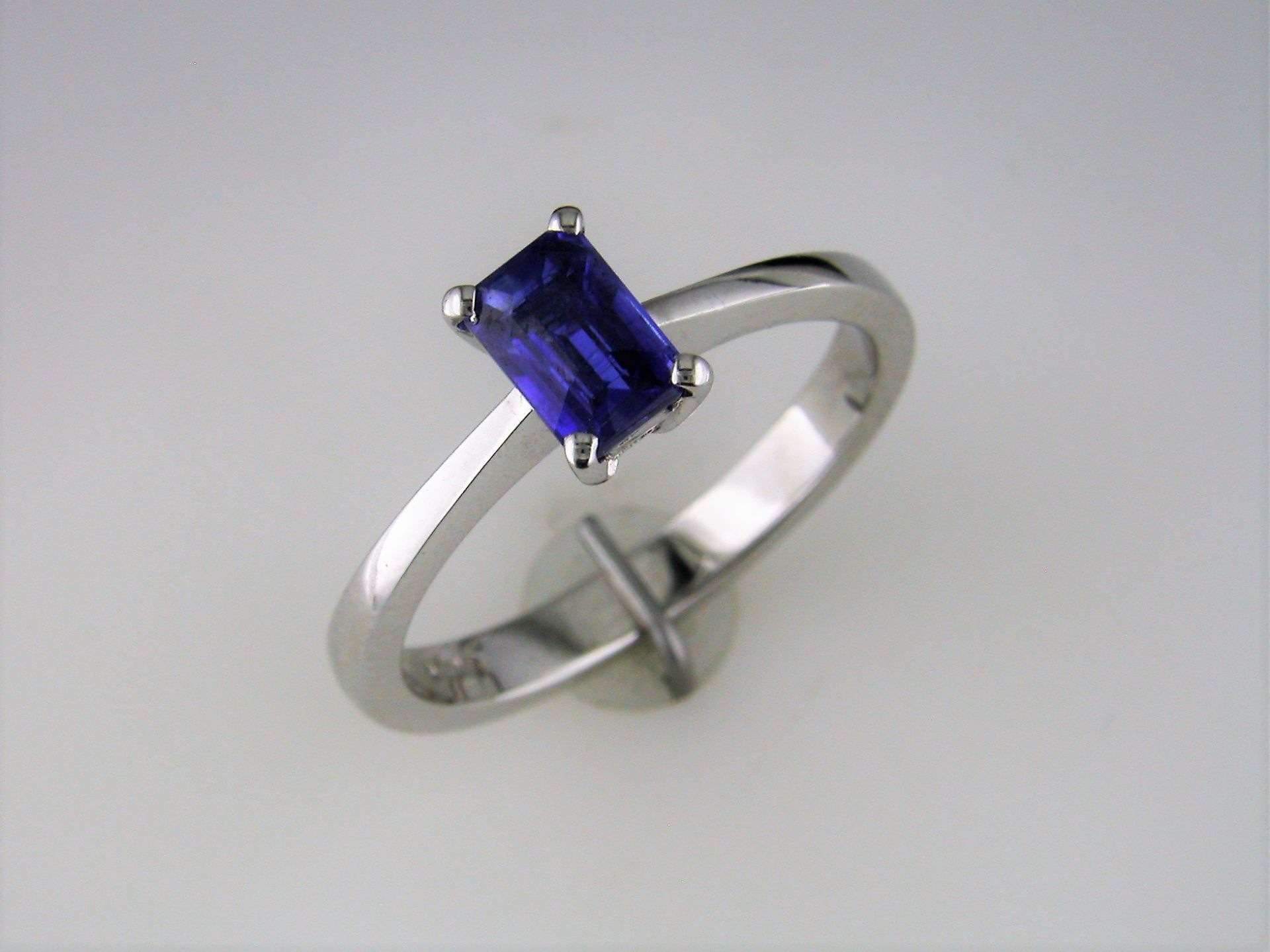 A Solitaire Ring set with a Kyanite Gemstone in an Emerald Cut