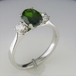 An Oval Diopside With Diamonds