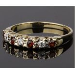 9CT GOLD GARNET AND CUBIC ZIRCONIA BAND RING