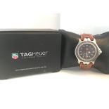 PRE OWNED TAG HEUER SEL GENTS QUARTZ WATCH. THEWATCH FEATURES A STAINLESS STEEL CASE, A
