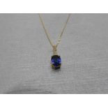 0.80ct sapphire and diamond drop style pendant. 7X 5mm oval sapphire set with 5 small brilliant