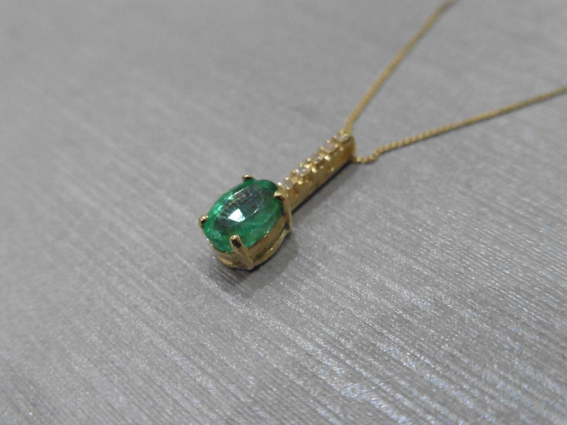 0.80ct emerald and diamond drop style pendant. 7X 5mm oval emerald set with 5 small brilliant cut - Image 3 of 3