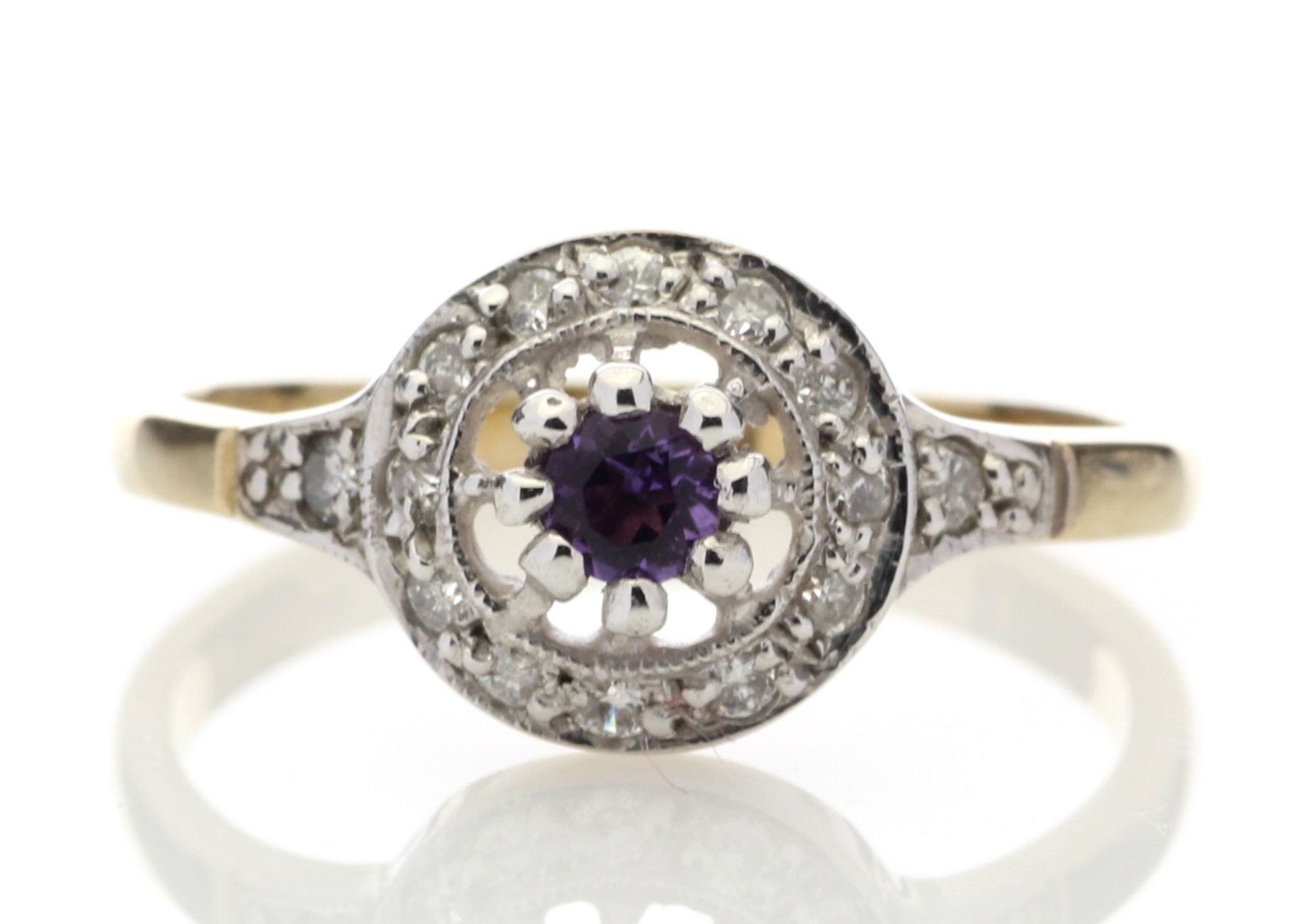 Amethyst and diamond cluster style ring set in 9ct gold. Round cut amethyst surrounded with