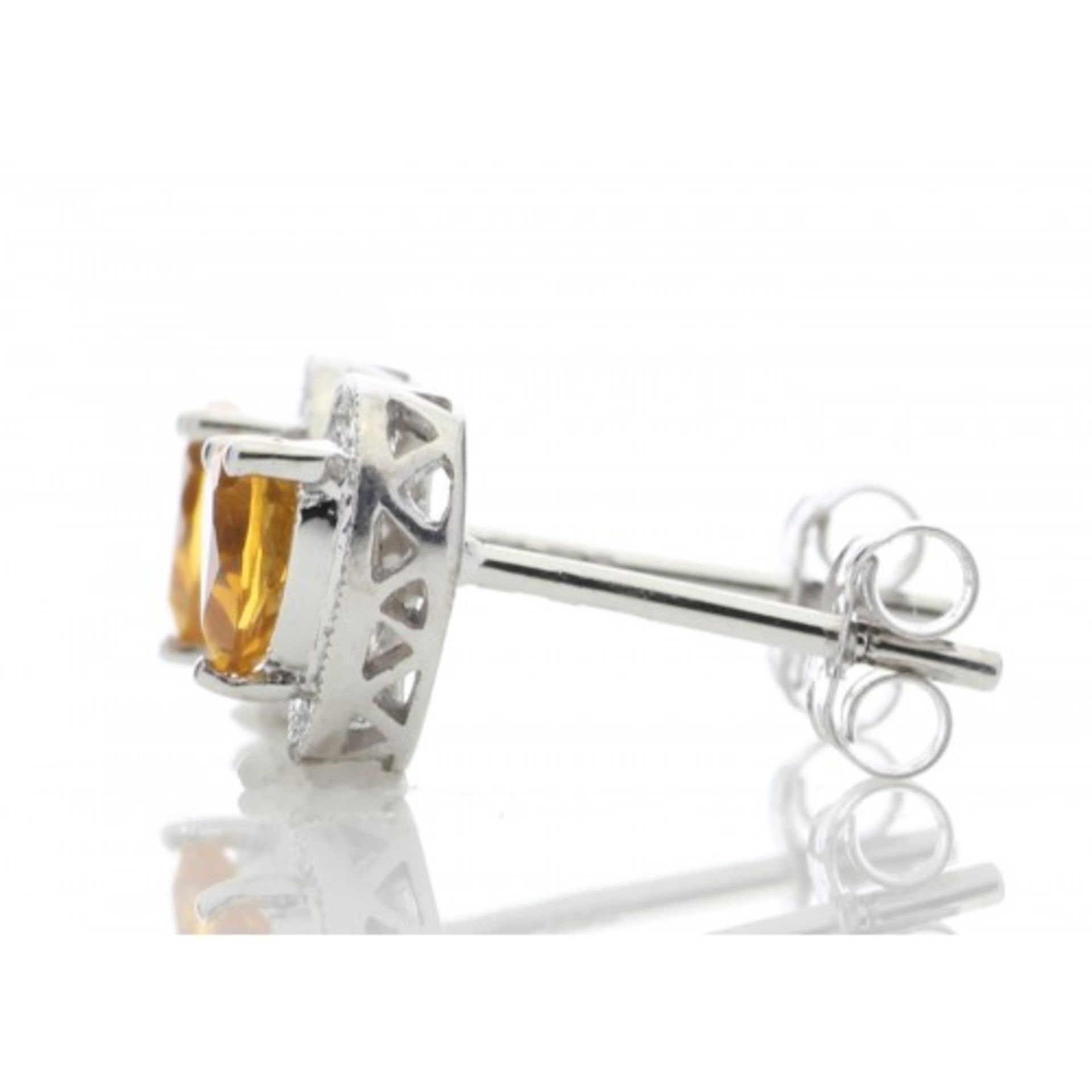 Citrine and diamond heart shaped stud earrings set in 9ct gold. 0.18ct weight. G colour and Si - Image 3 of 4