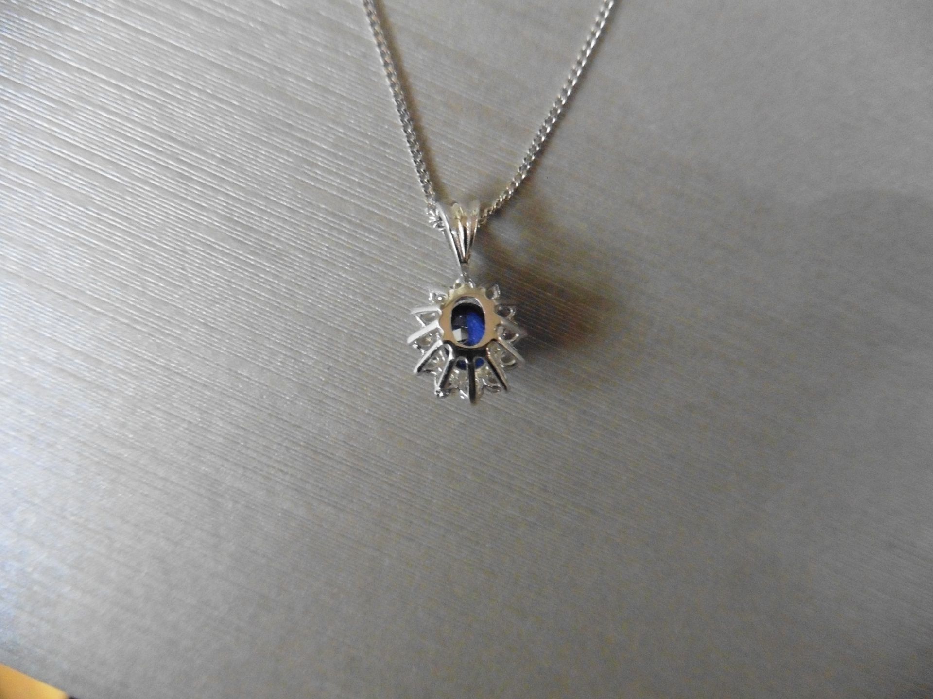 0.80ct sapphire and diamond cluster style pendant. ÊOval cut ( glass filled ) treated sapphire - Image 2 of 3
