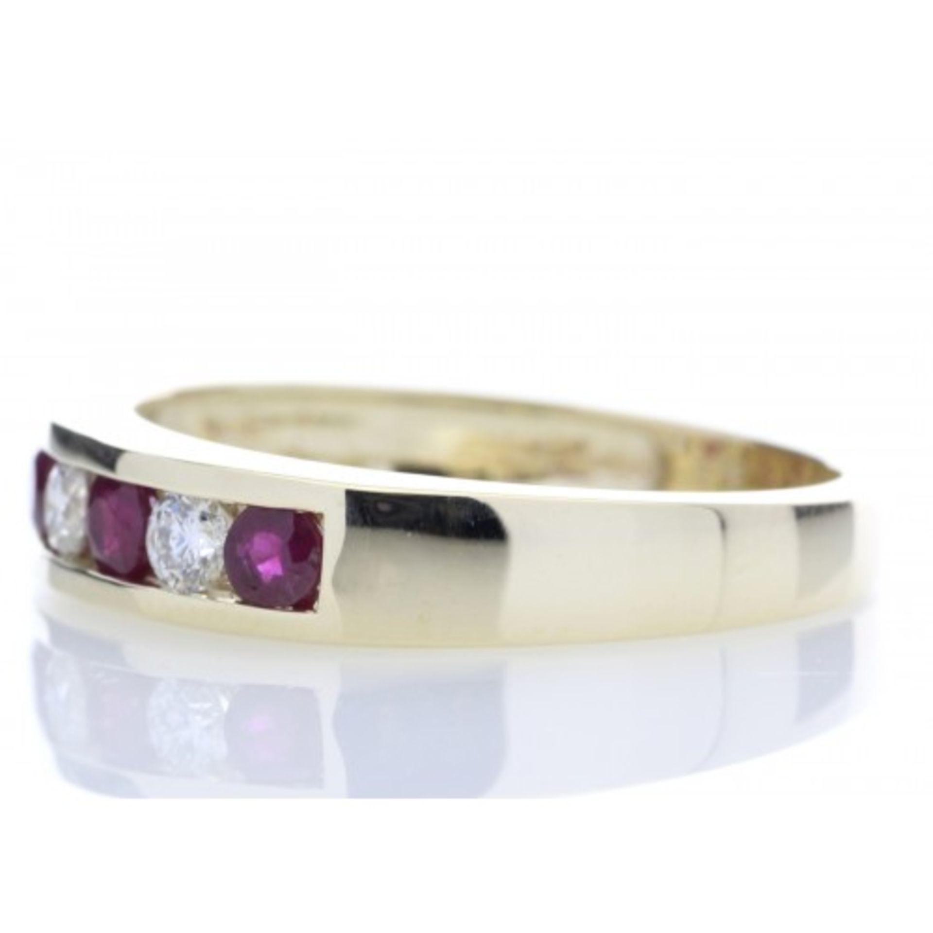 Ruby and diamond eternity style band ring set in 9ct gold. 0.25ct brilliant cut diamonds, H - Image 2 of 5