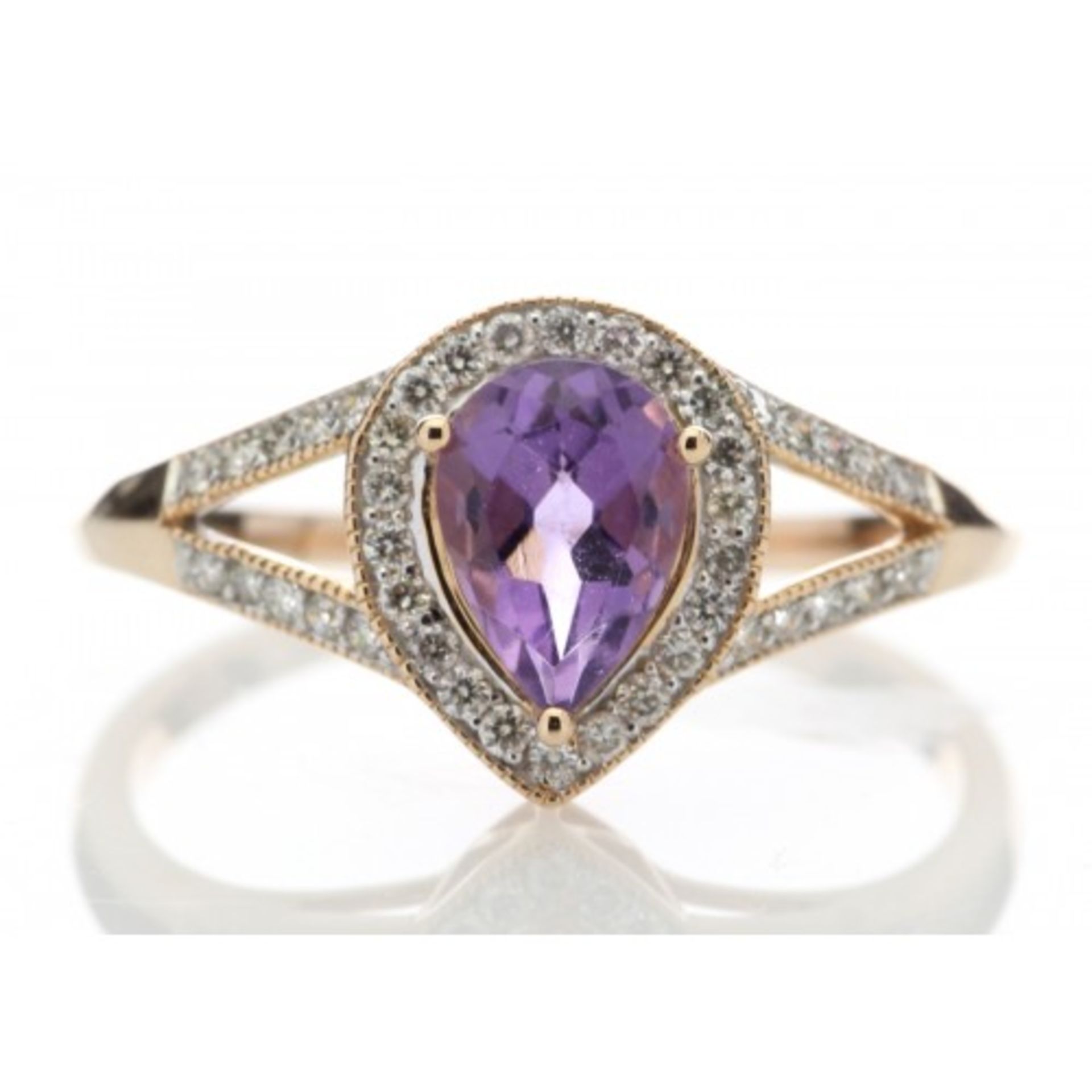 0.63ct amethyst and diamond dress ring set in 9ct rose gold. Pear shaped centre stone surrounded