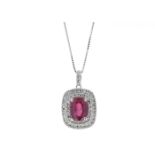 Ruby and diamond pendant set in 14ct gold. Oval cut ruby, 0.70ct, surrounded by brilliant cut