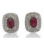 0.80ct ruby and diamond cluster stud earrings. 2 oval cut rubies surrounded with brilliant cut