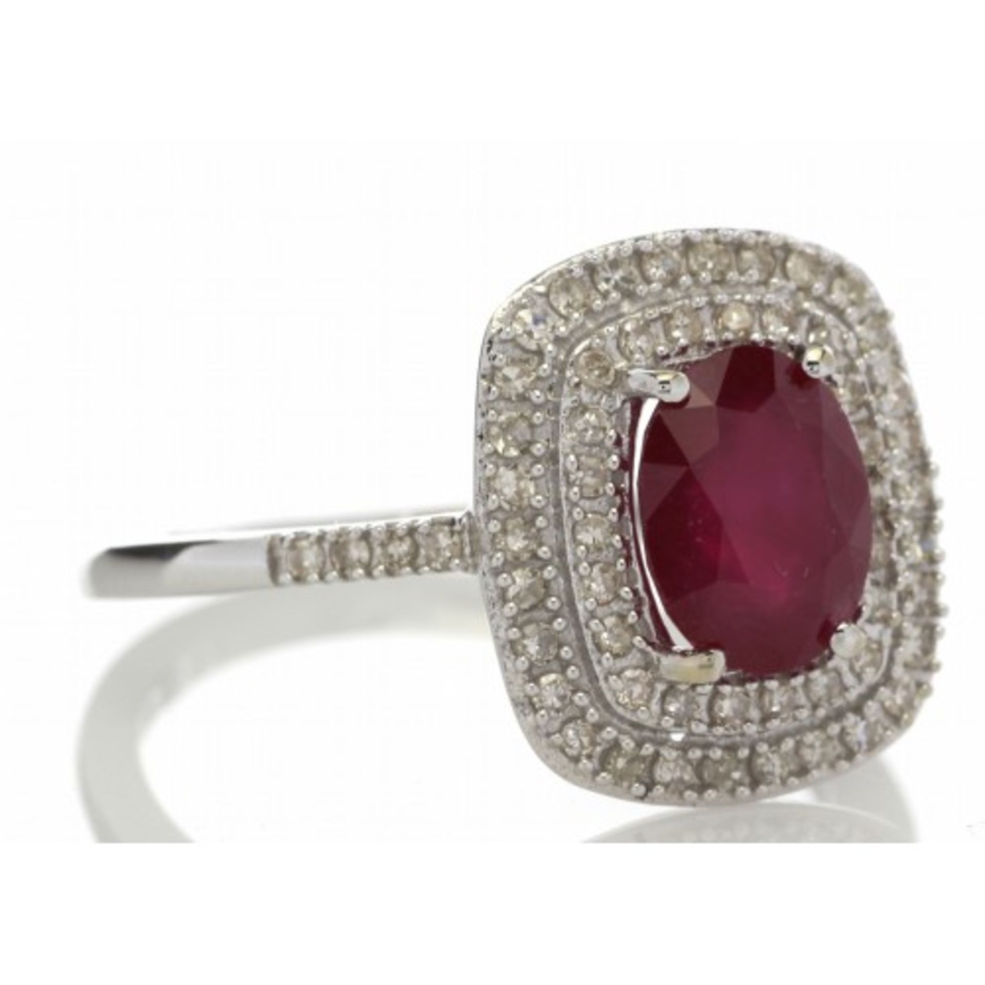 Ruby and diamond cluster dress ring set in 14ct gold. 1.54ct Oval cut ruby surrounded with a - Image 4 of 5