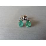 Emerald and Diamond drop earrings. Each set with a 6 x 5mm oval cut emerald ( treated), 1.60ct