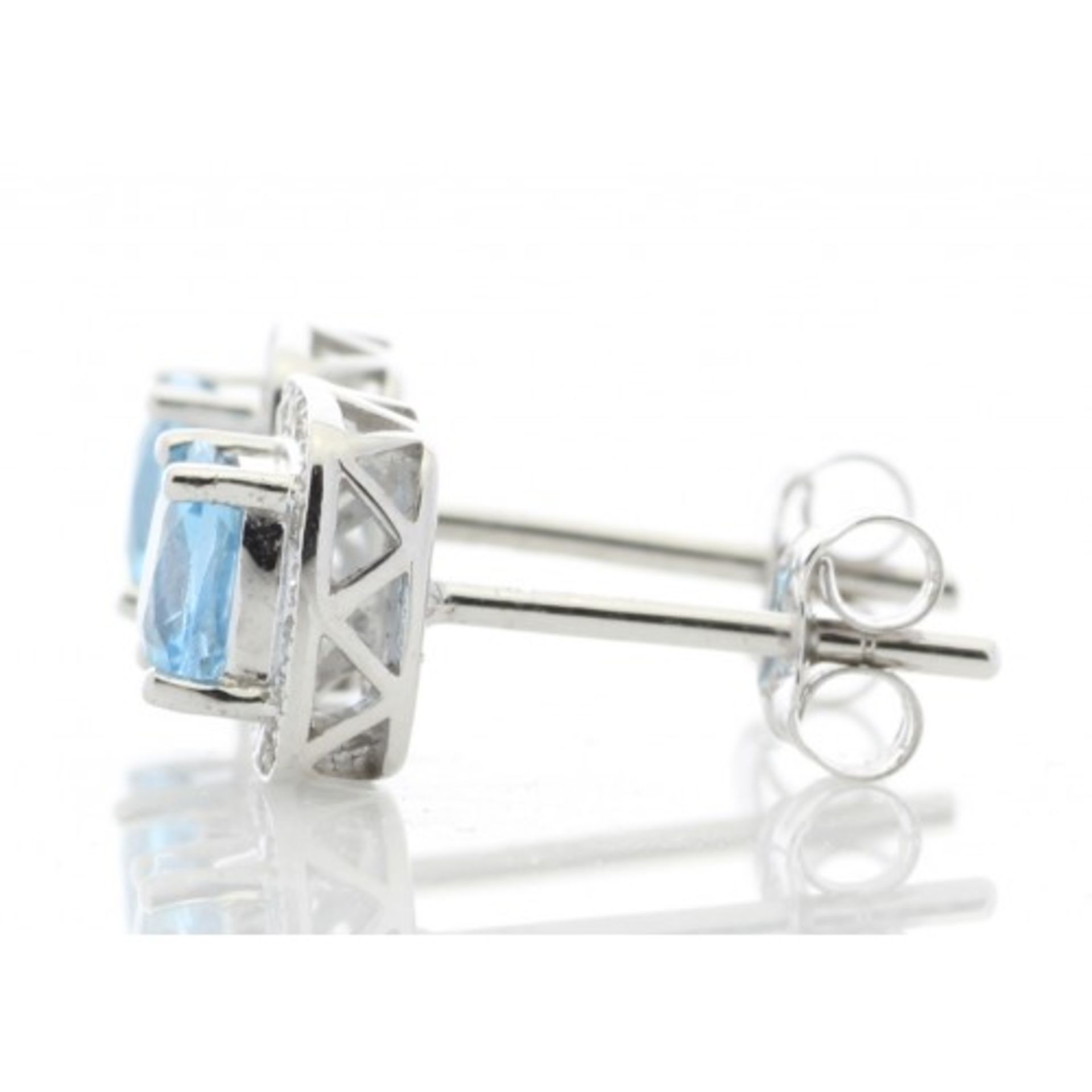 Blue topaz and diamond stud earrings. Cushion cut topaz surrounded by small brilliant cut - Image 3 of 4