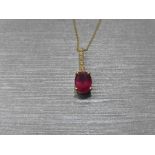 0.80ct ruby and diamond drop style pendant. 7X 5mm oval ruby set with 5 small brilliant cut