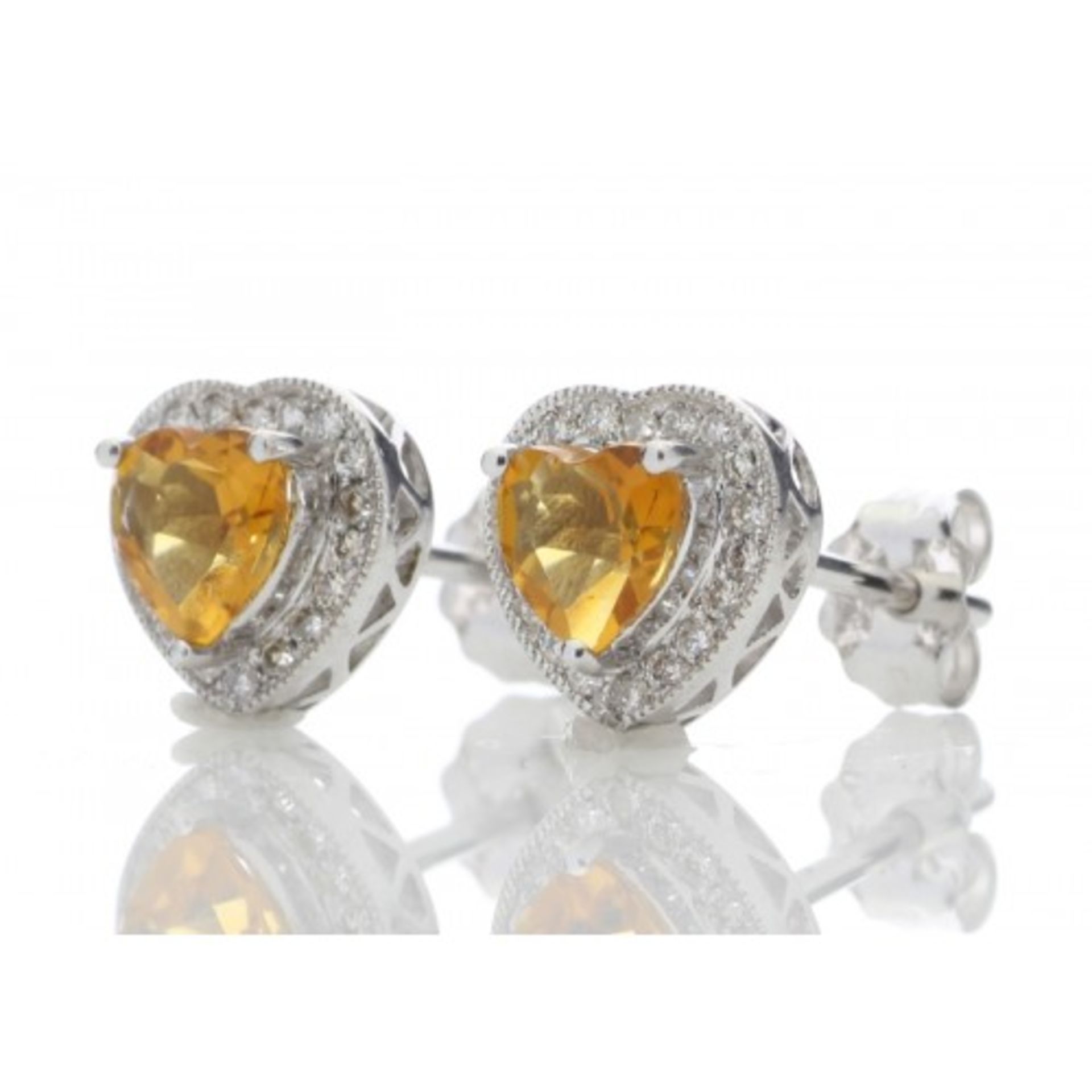 Citrine and diamond heart shaped stud earrings set in 9ct gold. 0.18ct weight. G colour and Si - Image 2 of 4