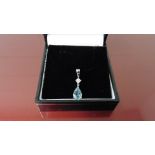 0.35ct Aqua Marine and diamond drop style pendant ( no chain ).Pear shaped aqua ( treated ) 0.35ct