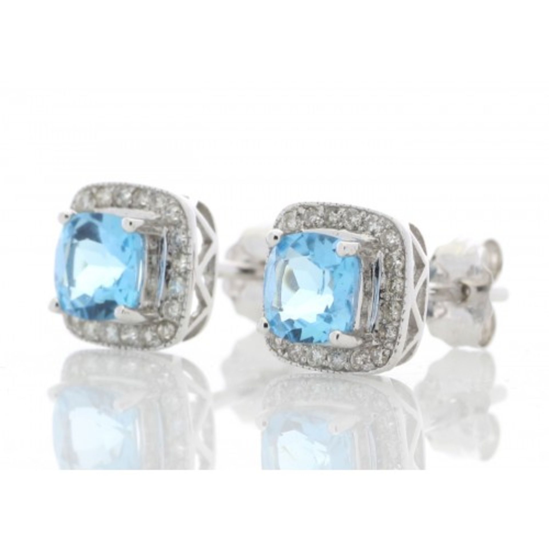 Blue topaz and diamond stud earrings. Cushion cut topaz surrounded by small brilliant cut - Image 2 of 4