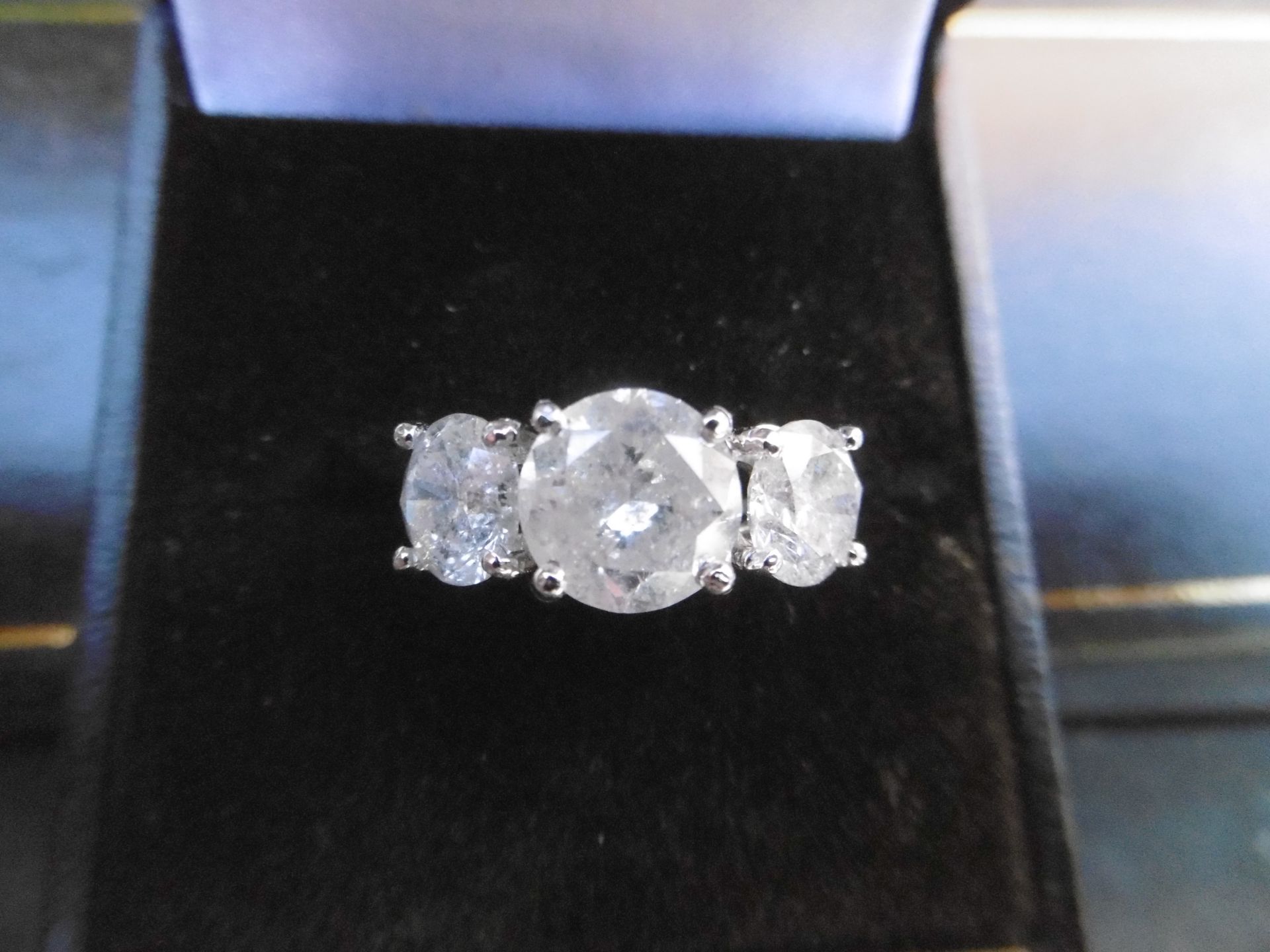 A large 3 stone diamond ring