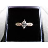 14 ct Gold Marquise cut Diamond ring.0.48CT plus 4 small round cut Diamonds on each shoulder