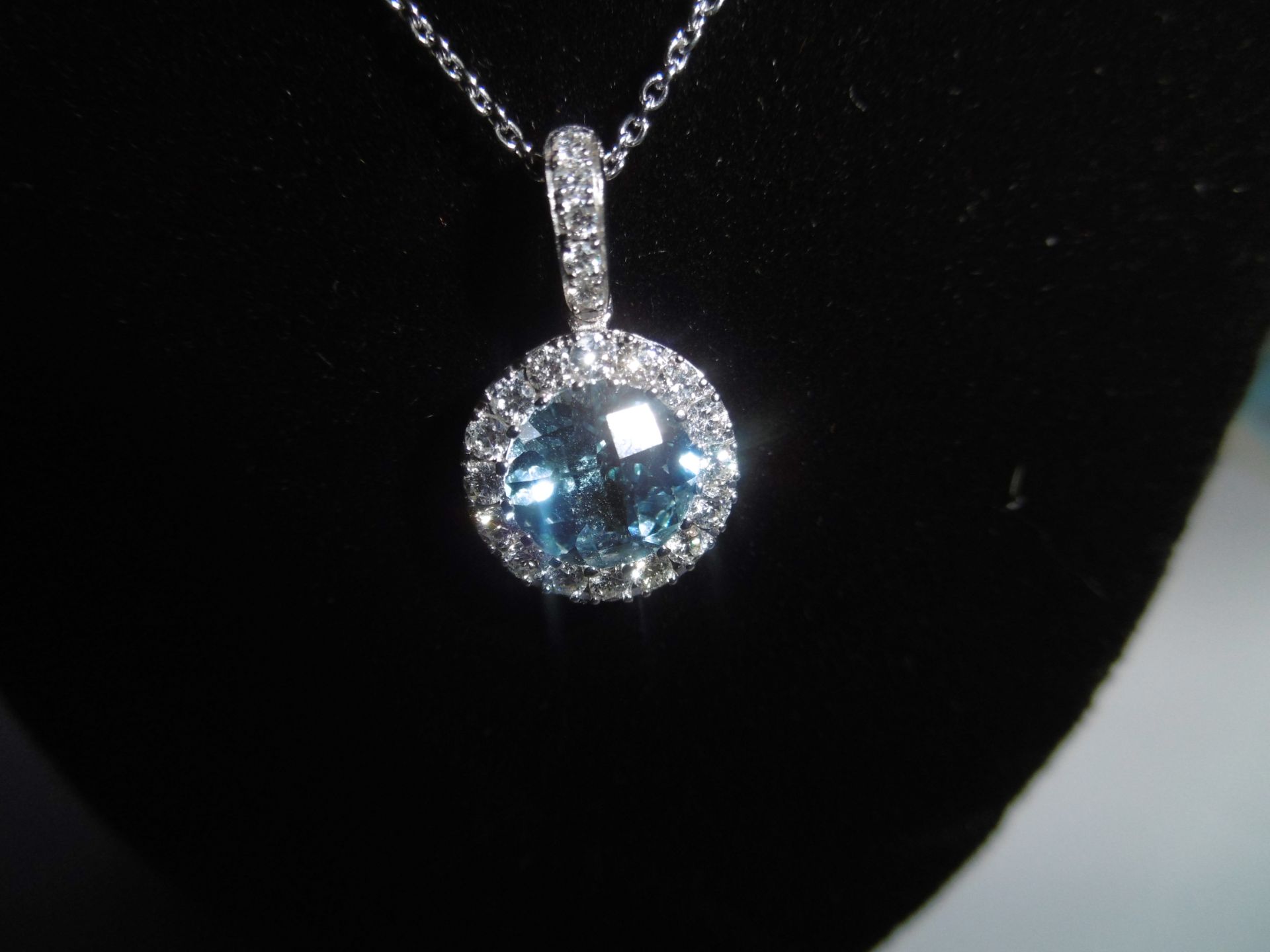 Very Pretty Topaz and Diamond pendant