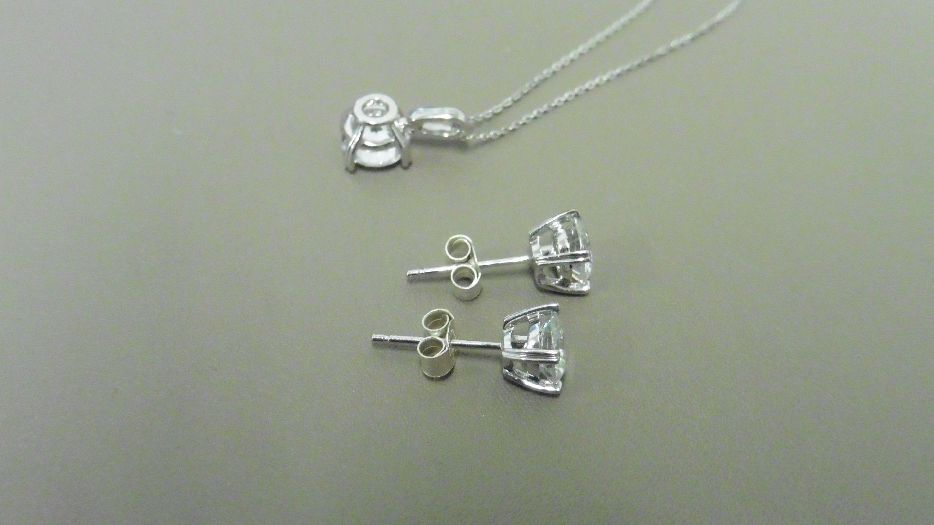 0.45ct / 0.80ct diamond pendant and earring set in platinum. Pendant - 0.40ct brilliant cut diamond, - Image 2 of 2