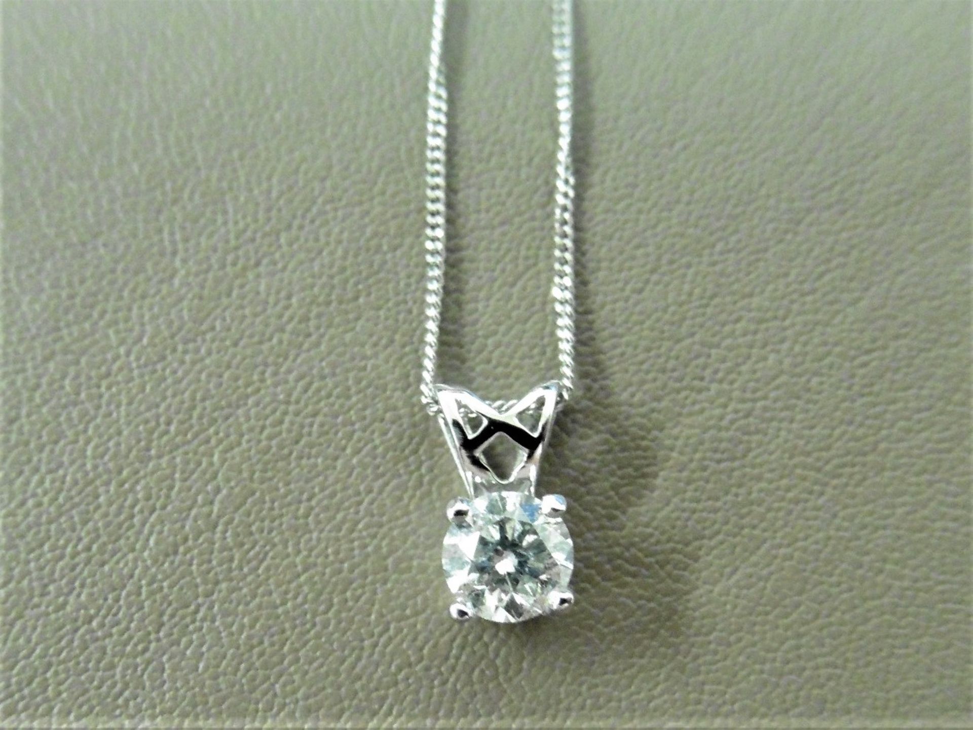 0.33ct diamond set pendant. Brilliant cut diamond, I colour and si3 clarity.4 claw setting with