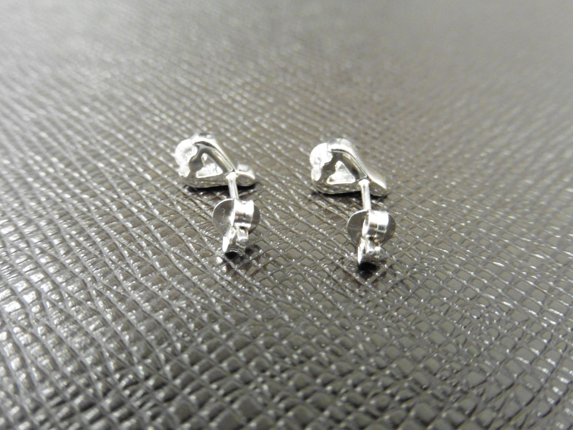 0.10ct diamond tear drop earrings set in platinum 950. 2 small brilliant cut diamonds, H colourand - Image 2 of 3
