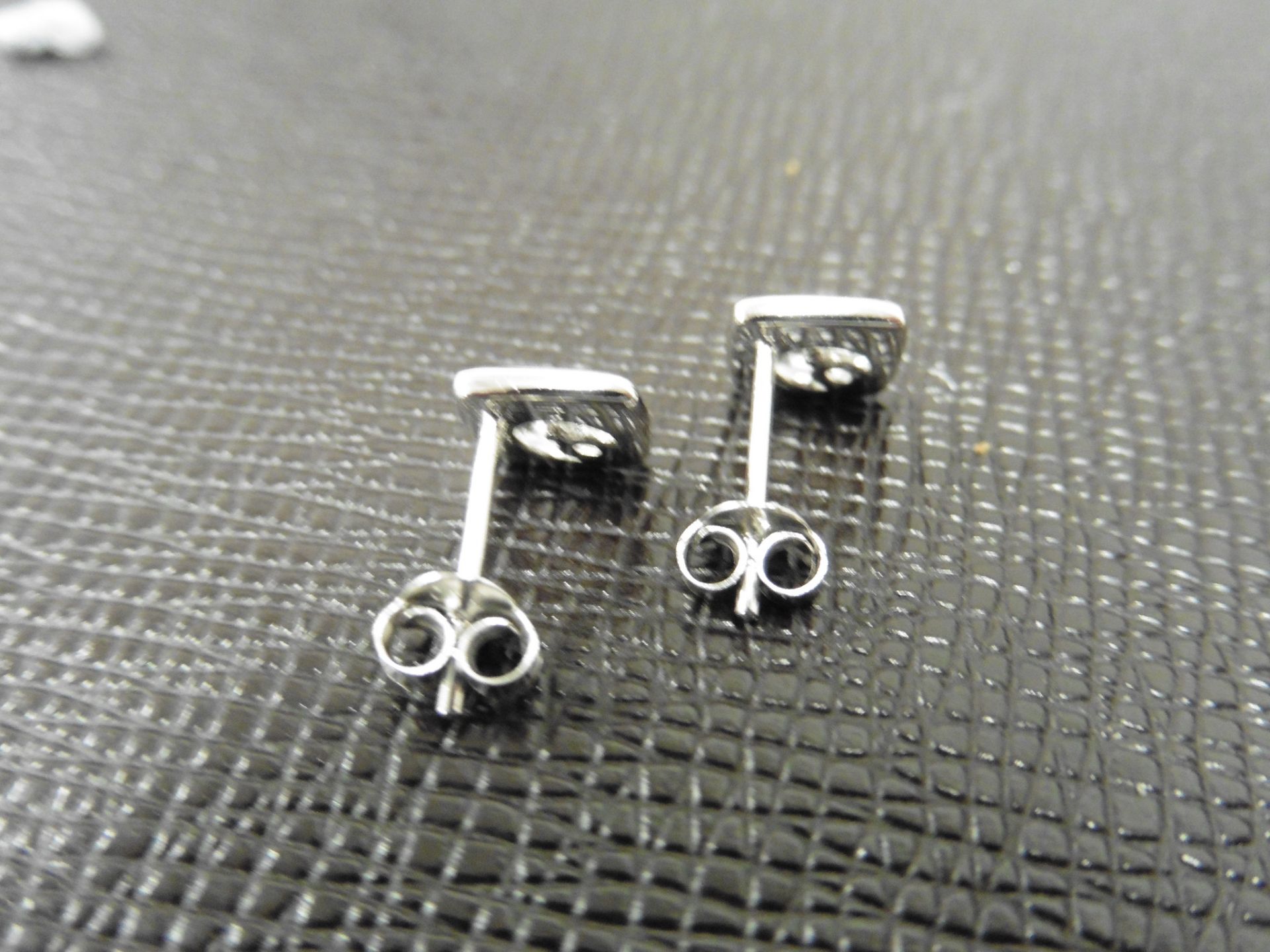 0.10ct diamond earrings set in platinum 950. 2 small brilliant cut diamonds, H colourand si2 - Image 3 of 3